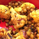 Crispy chickpeas and crunchy cauliflower are great base for a vegetarian sheetpan dinner.